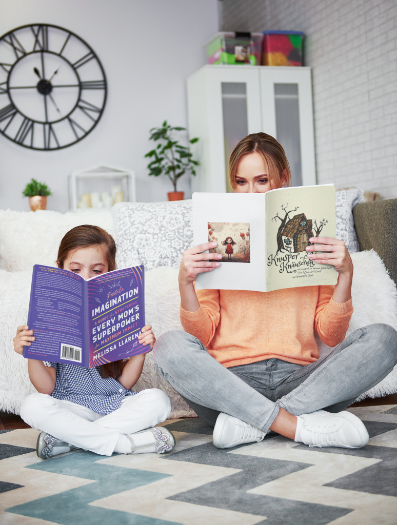 mockup-of-a-mom-and-her-daughter-reading-books-at-home-m27503-r-el2